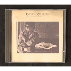 Paul Young ‎– Between Two...