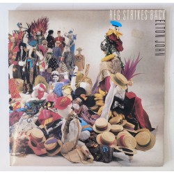 Elton John – Reg Strikes...